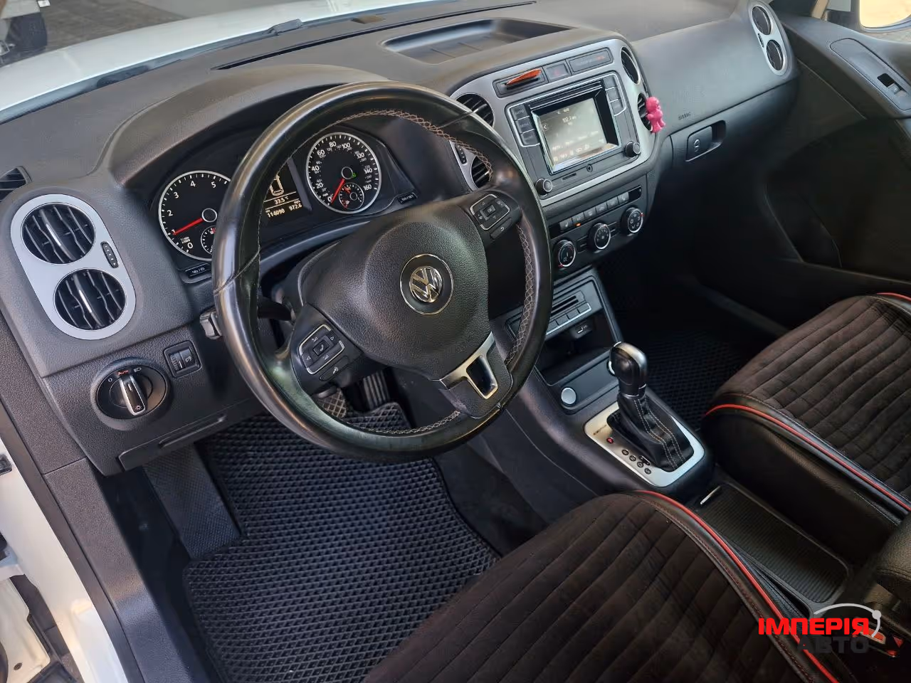 Volkswagen Tiguan - фото 13