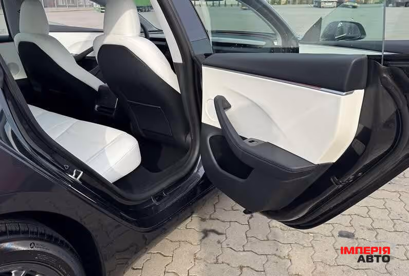 Tesla Model 3 - фото 10