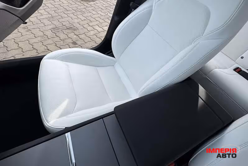 Tesla Model 3 - фото 9
