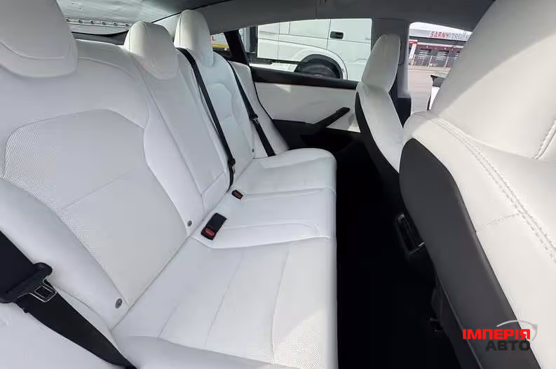 Tesla Model 3 - фото 11