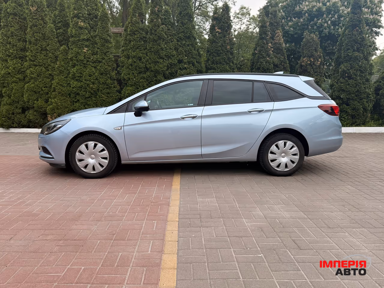 Opel Astra - фото 11