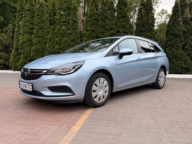 Opel Astra - фото 1