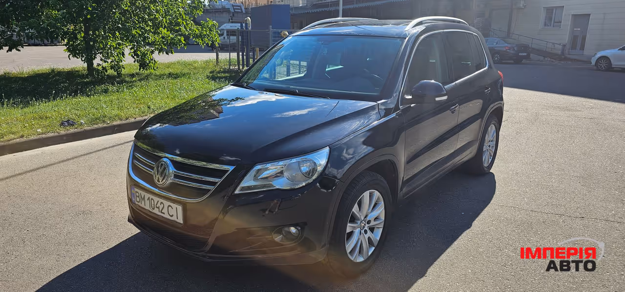 Volkswagen Tiguan - фото 1