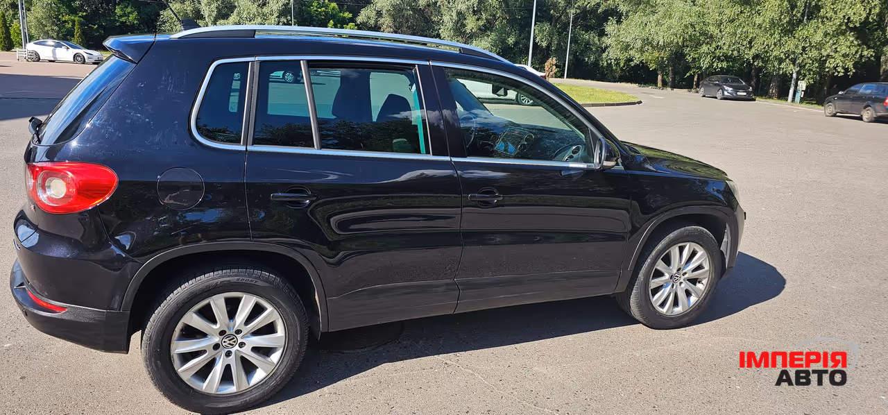 Volkswagen Tiguan - фото 11