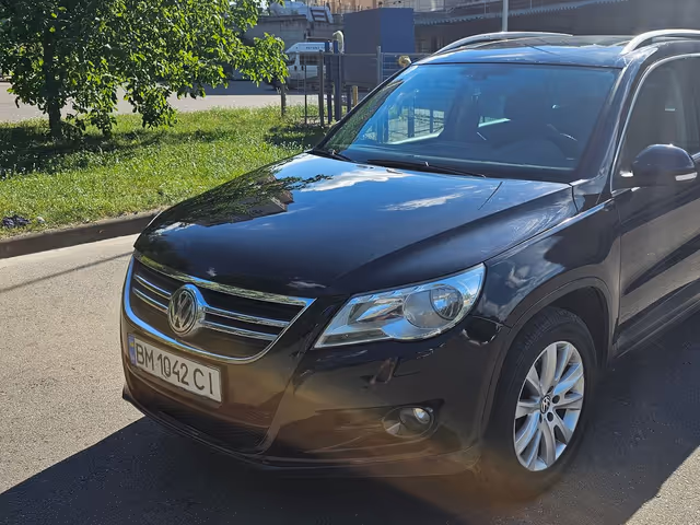 Volkswagen Tiguan - фото 1