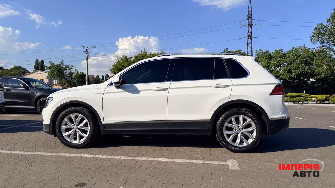 Volkswagen Tiguan - фото 12