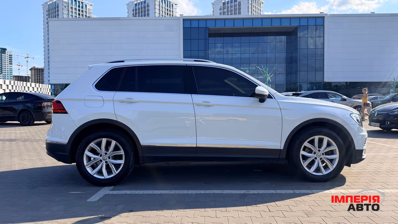 Volkswagen Tiguan - фото 13