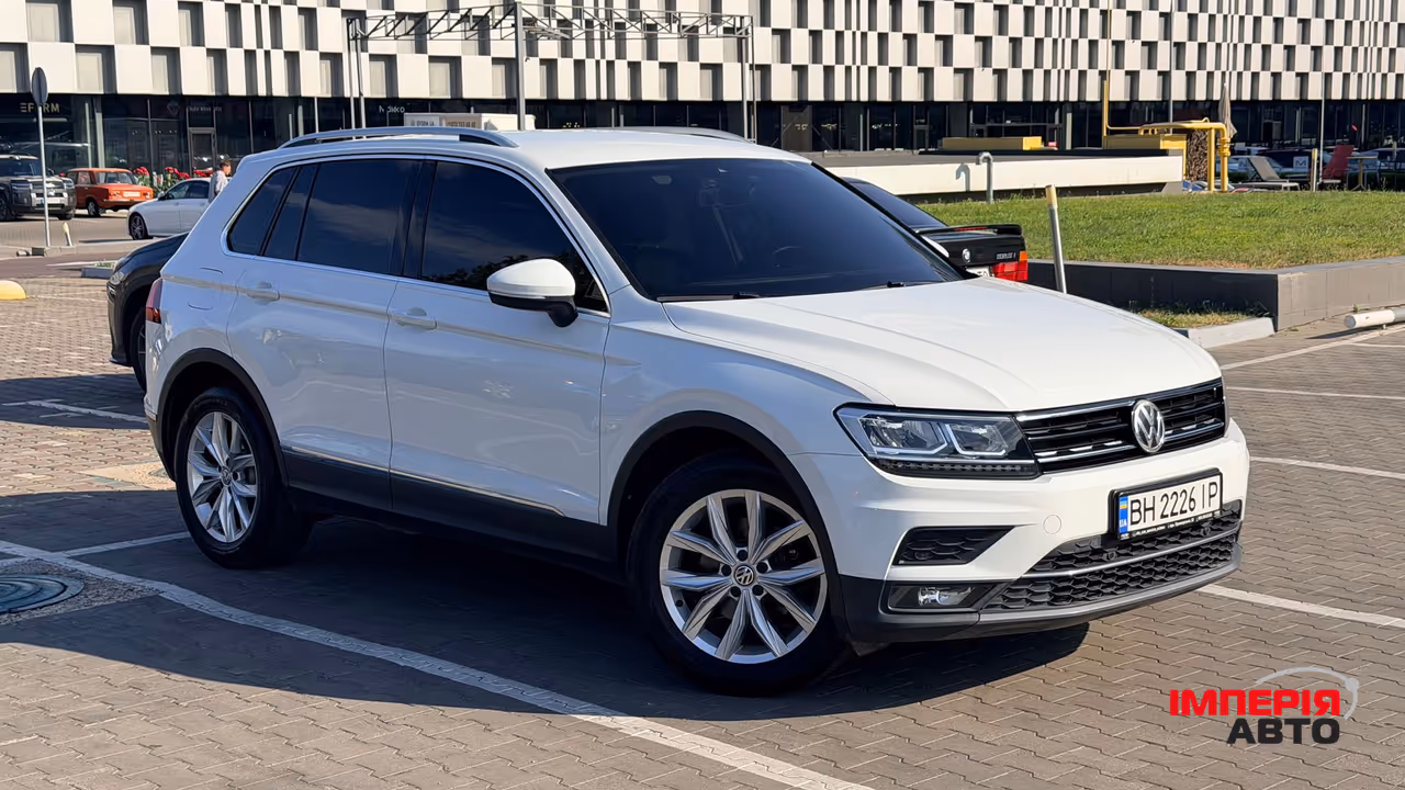 Volkswagen Tiguan - фото 1