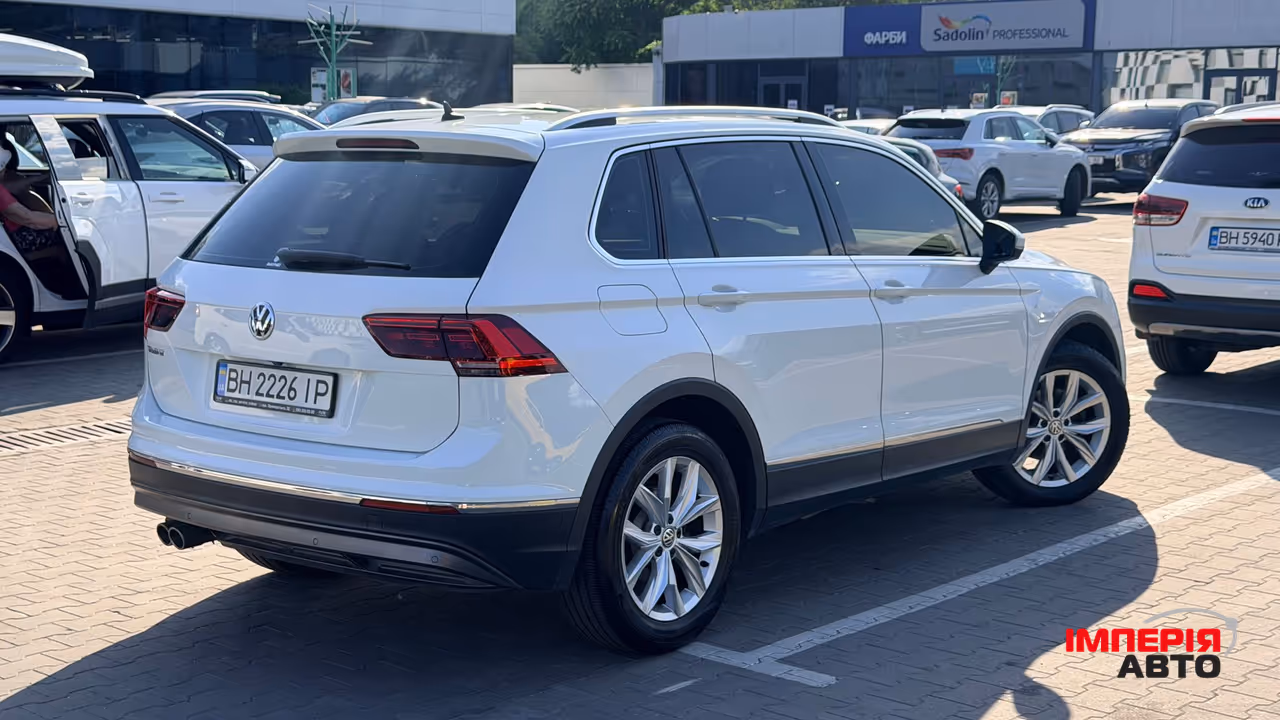 Volkswagen Tiguan - фото 11