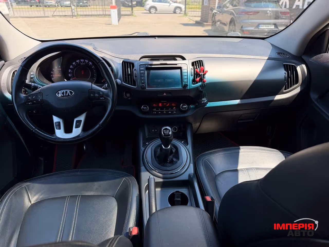 Kia Sportage - фото 10