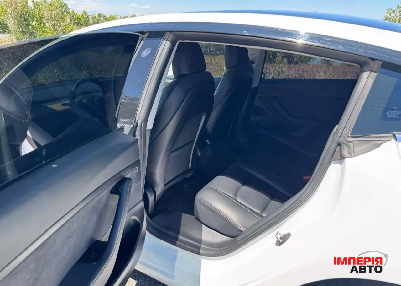 Tesla Model 3 - фото 5