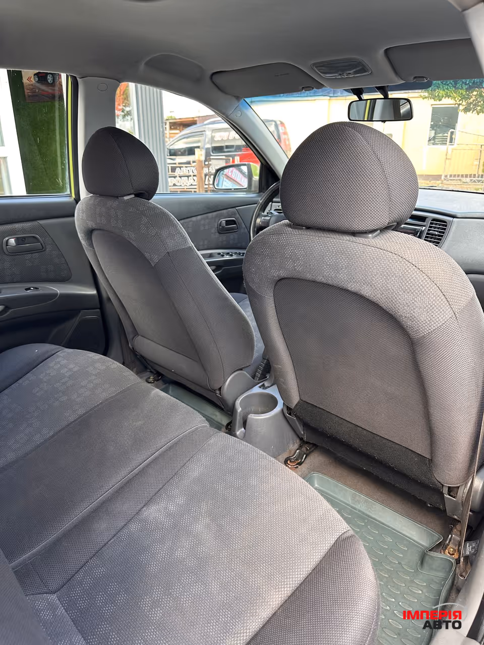 Kia Rio - фото 8