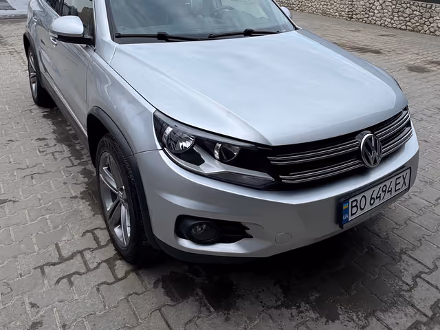 Volkswagen Tiguan - фото 1