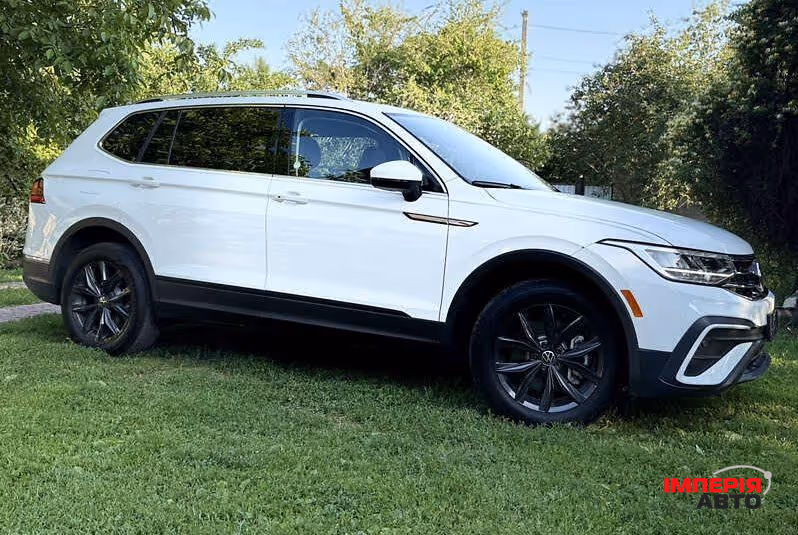 Volkswagen Tiguan - фото 7