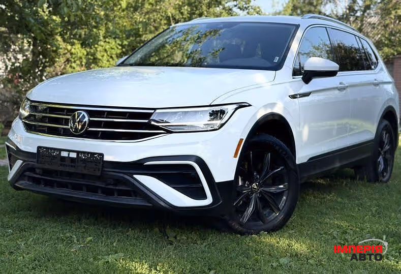 Volkswagen Tiguan - фото 1