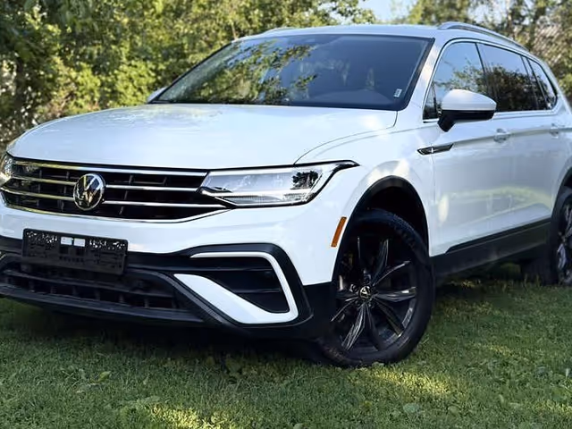 Volkswagen Tiguan - фото 1