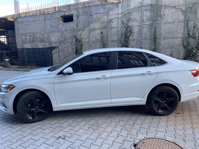 Volkswagen Jetta - фото 5