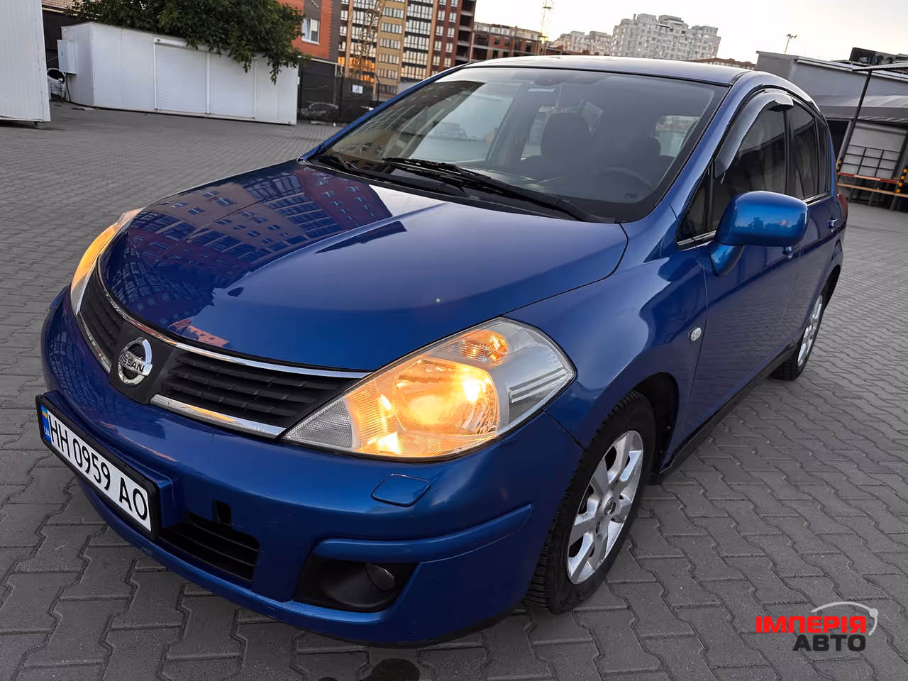 Nissan Tiida - фото 16