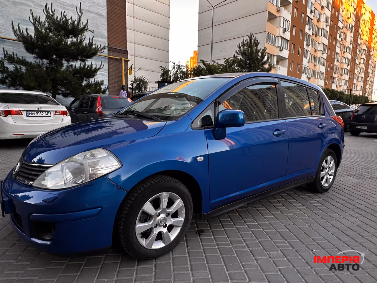 Nissan Tiida - фото 10