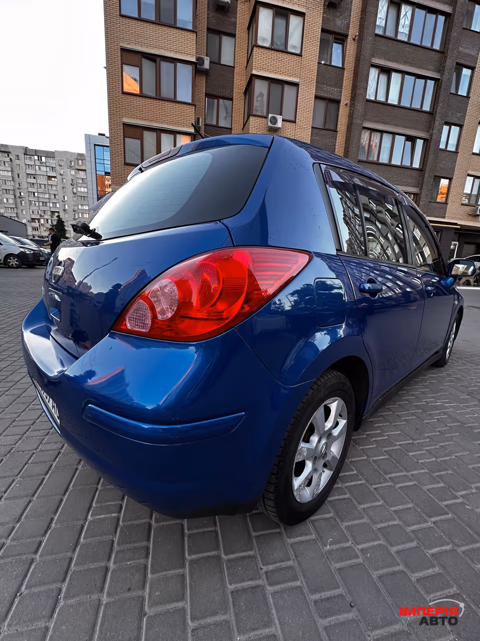 Nissan Tiida - фото 14