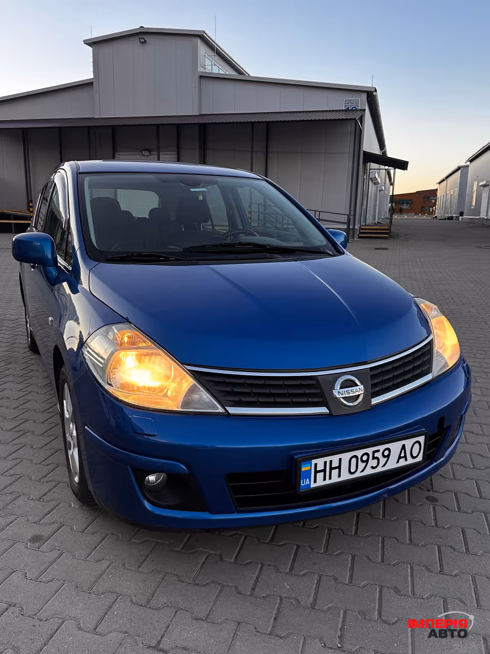Nissan Tiida - фото 17