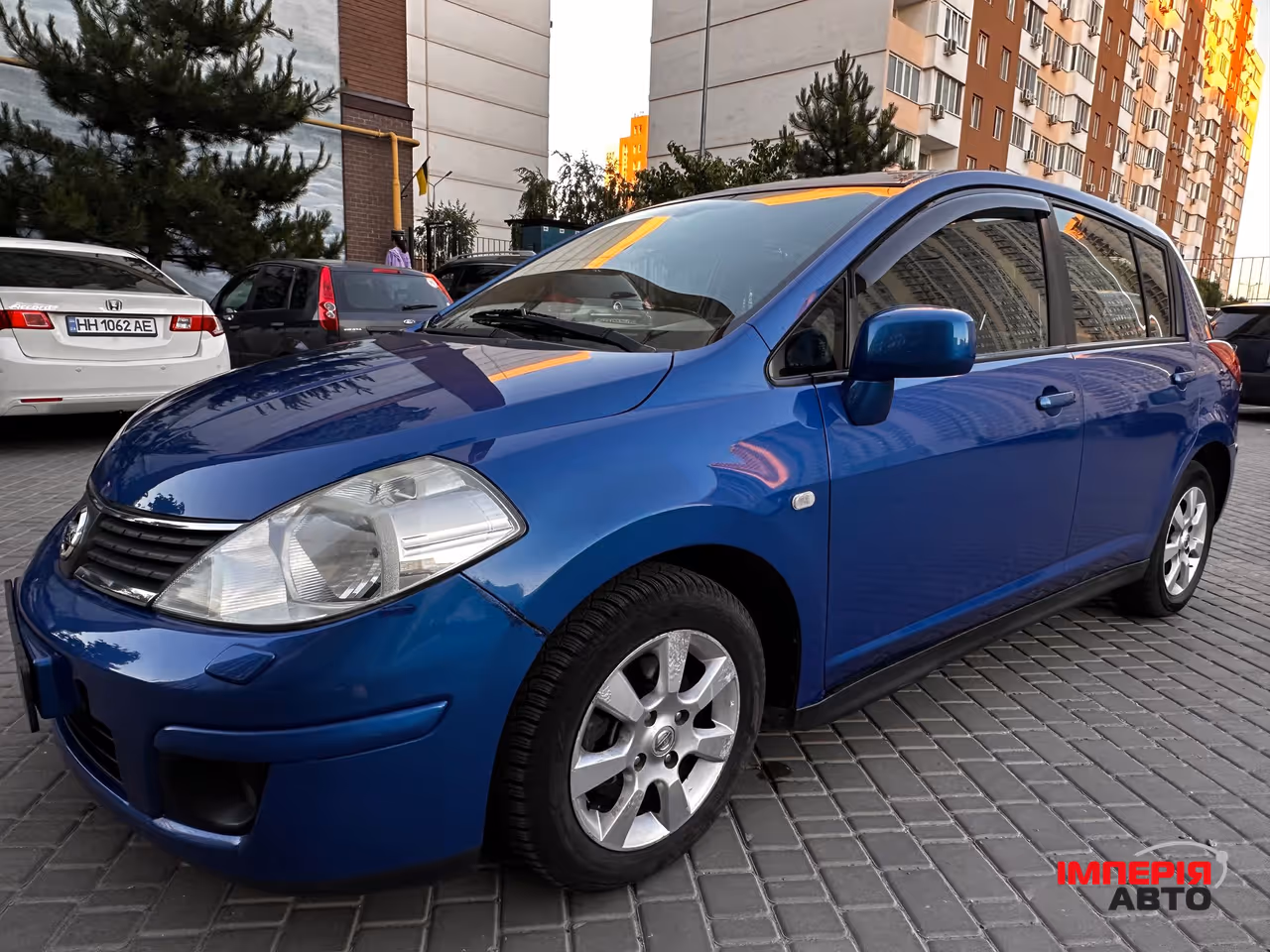 Nissan Tiida - фото 11