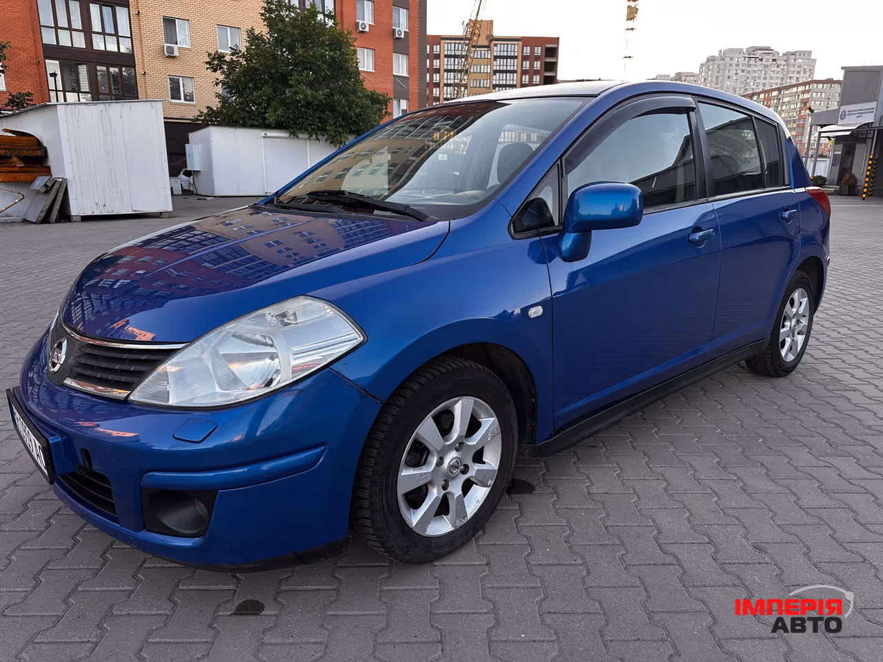 Nissan Tiida - фото 21