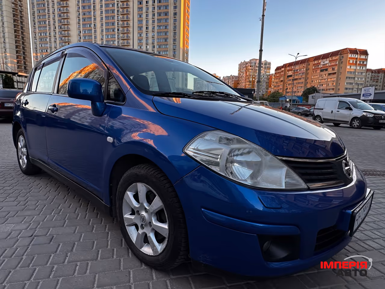 Nissan Tiida - фото 13