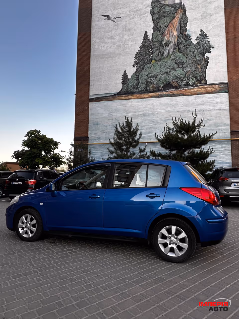 Nissan Tiida - фото 5