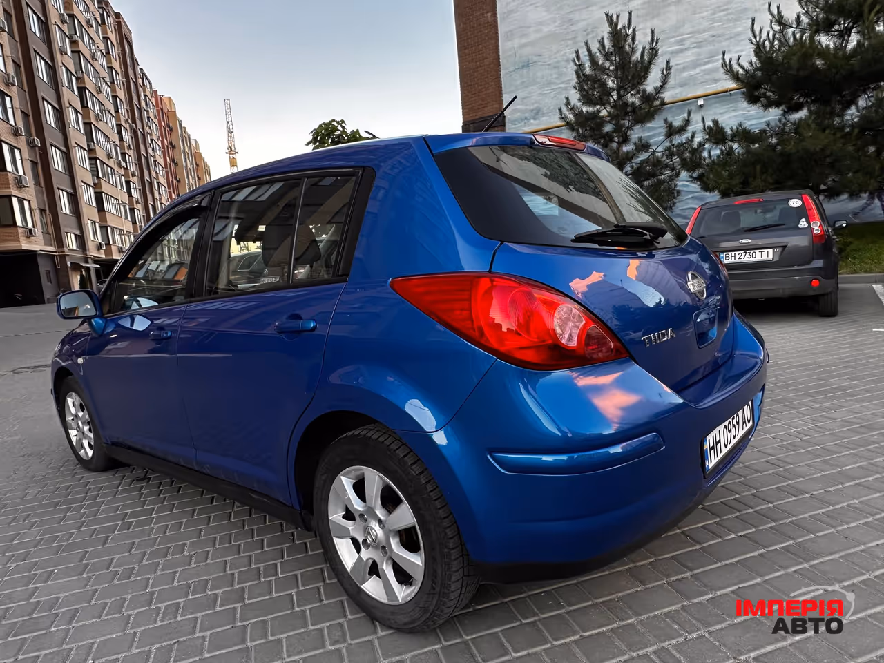 Nissan Tiida - фото 9