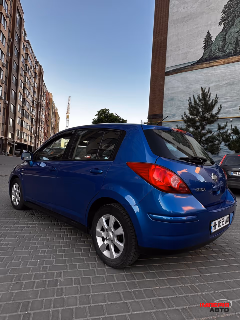 Nissan Tiida - фото 8