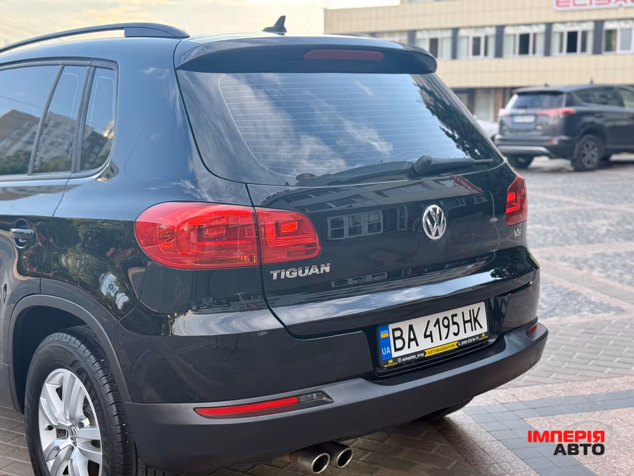 Volkswagen Tiguan - фото 16