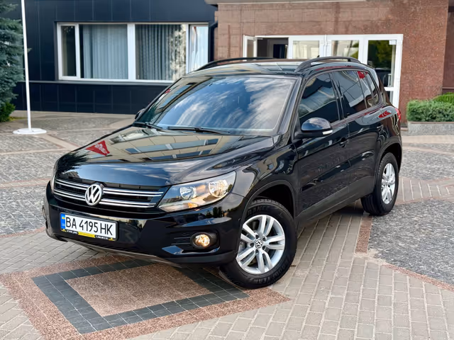 Volkswagen Tiguan - фото 1
