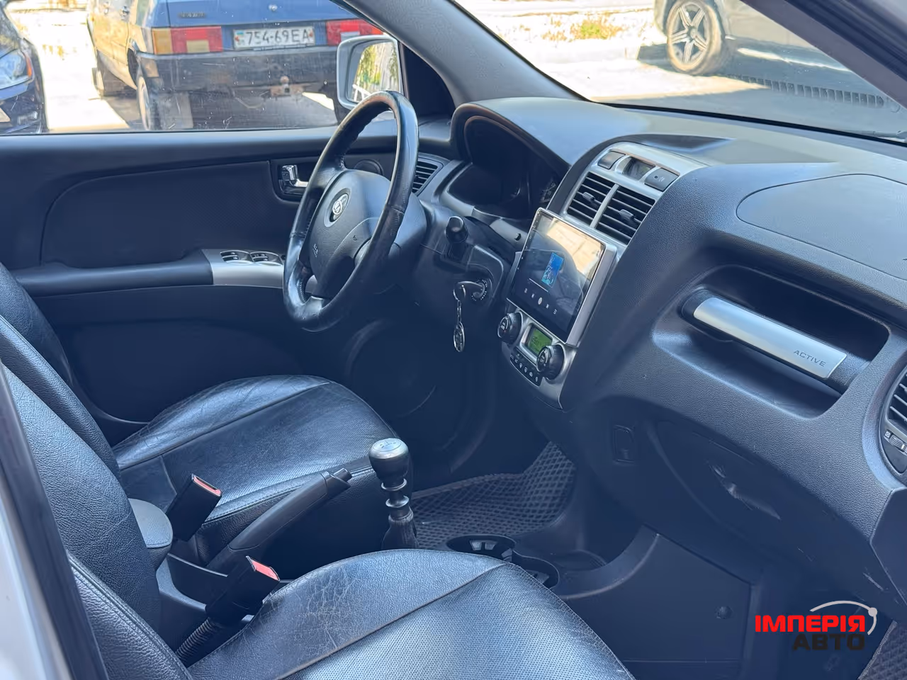 Kia Sportage - фото 13