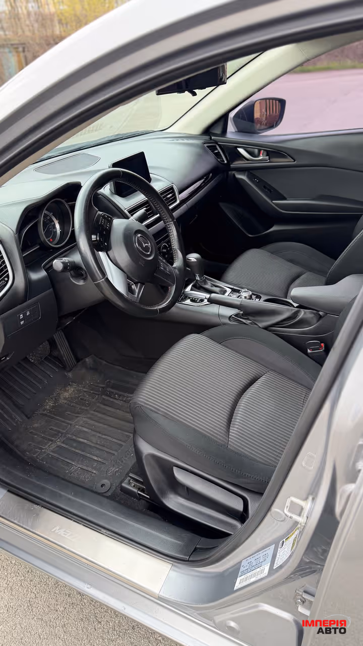 Mazda 3 - фото 6