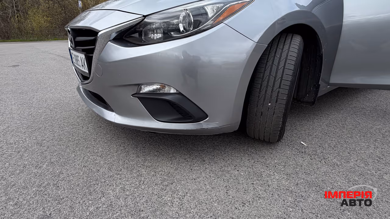 Mazda 3 - фото 12