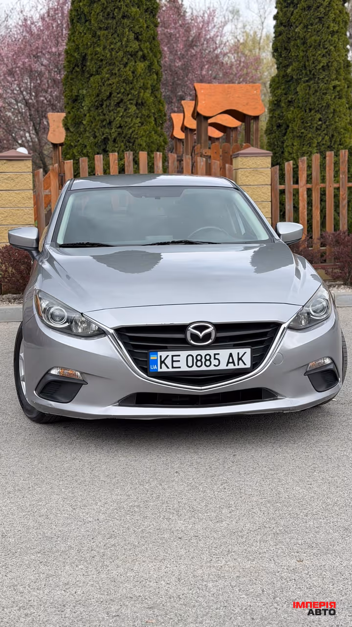 Mazda 3 - фото 2