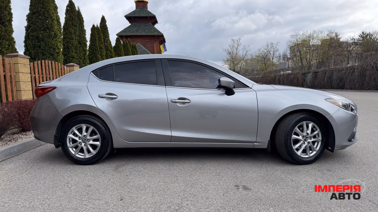 Mazda 3 - фото 4