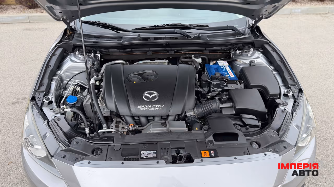 Mazda 3 - фото 11
