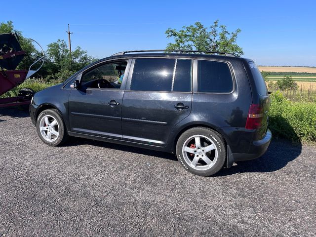Volkswagen Touran - фото 2