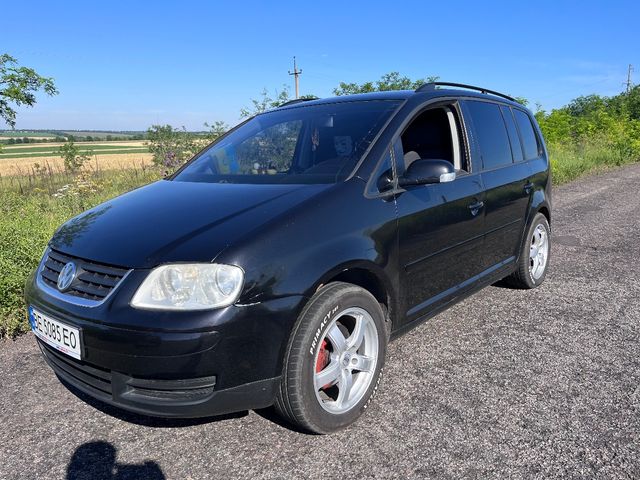 Volkswagen Touran - фото 4