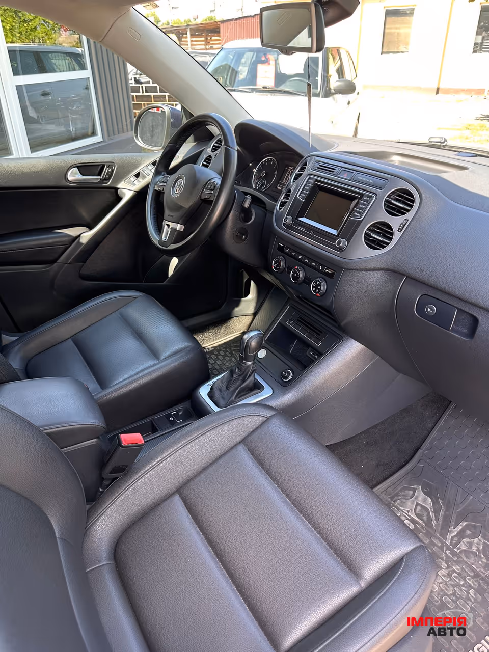 Volkswagen Tiguan - фото 6