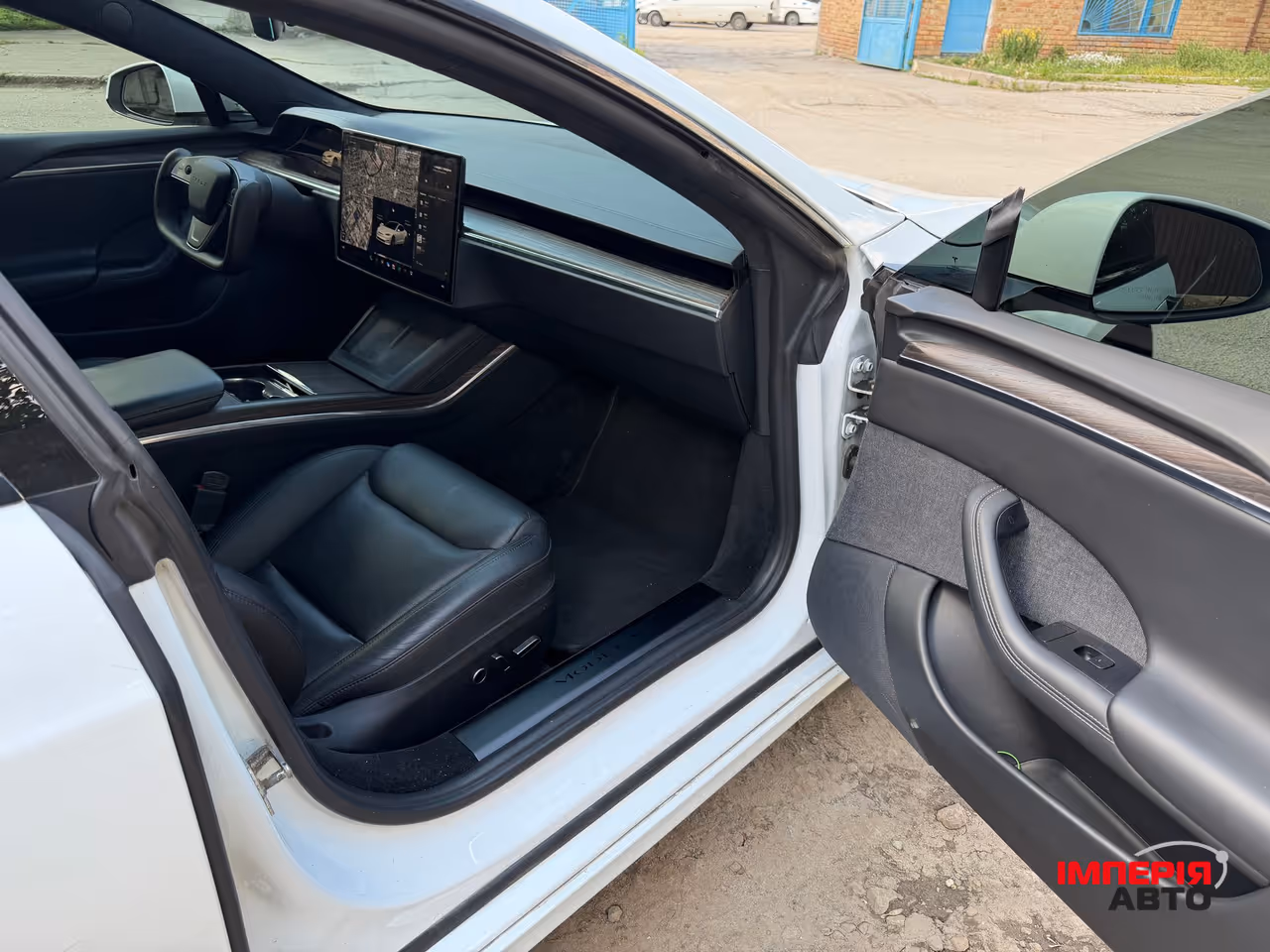 Tesla Model S - фото 12
