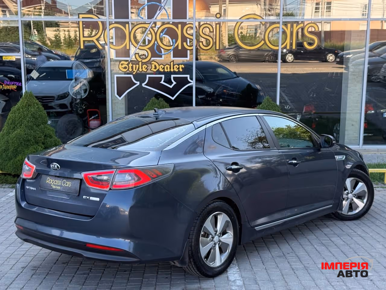 Kia Optima - фото 5