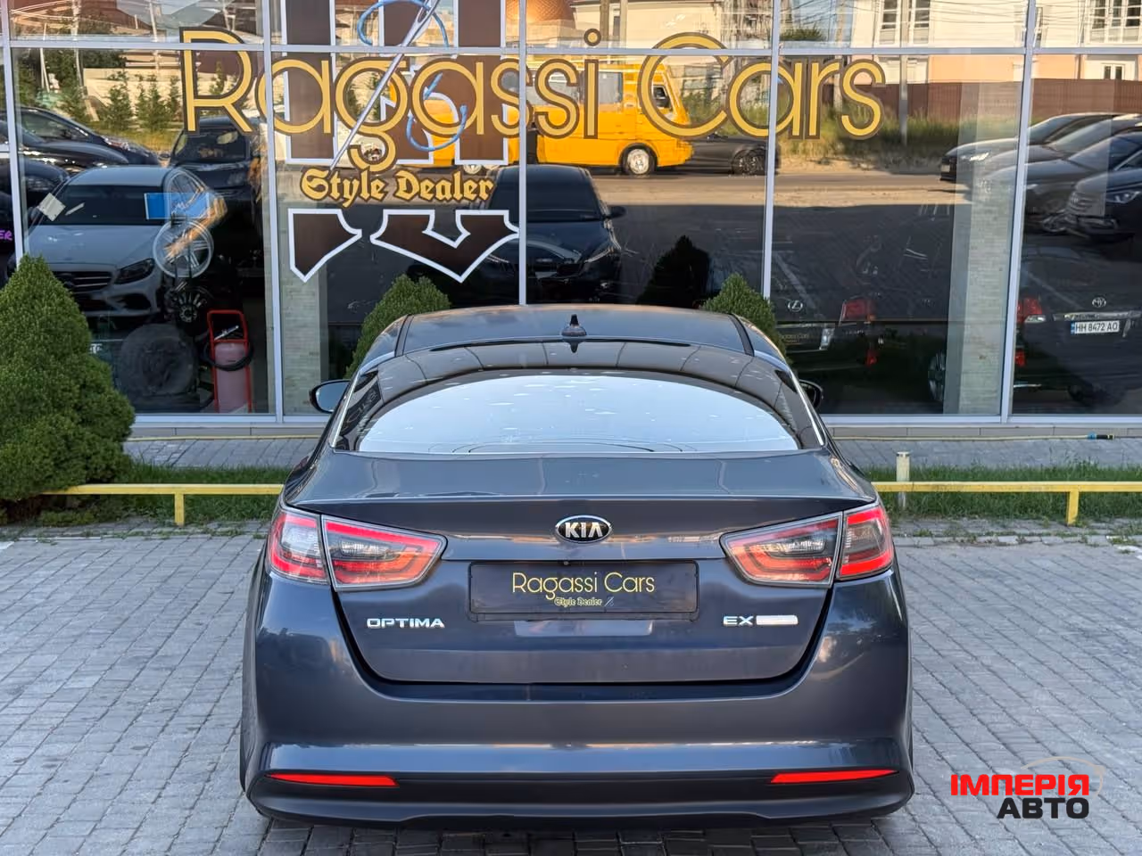 Kia Optima - фото 4