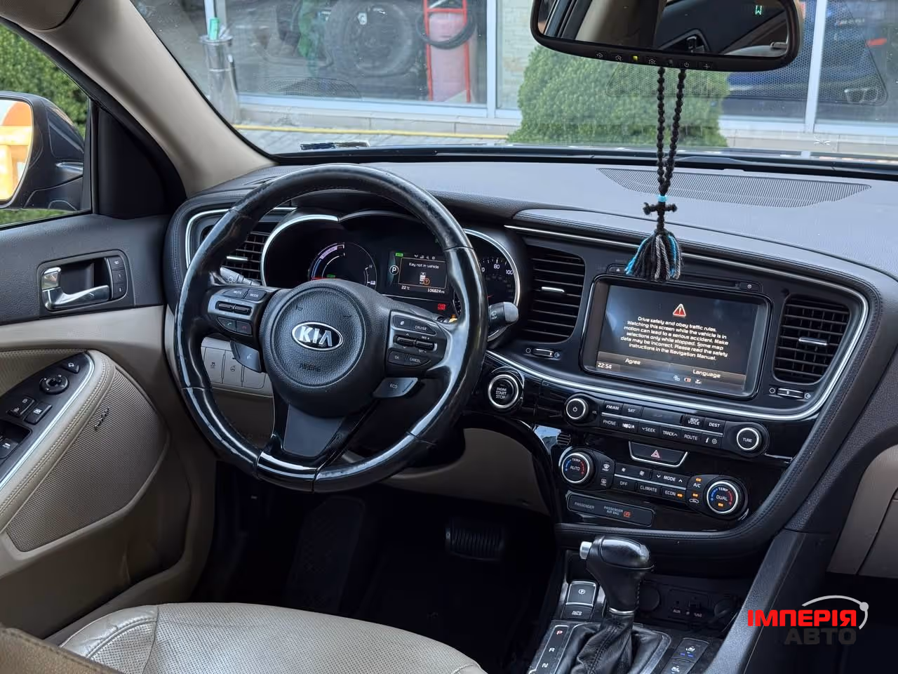 Kia Optima - фото 6
