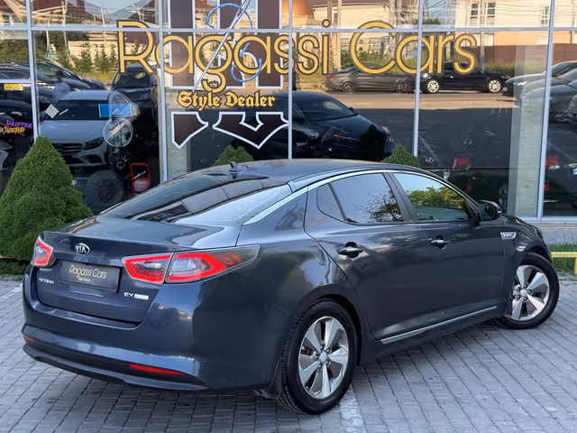 Kia Optima - фото 5