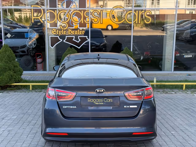 Kia Optima - фото 4
