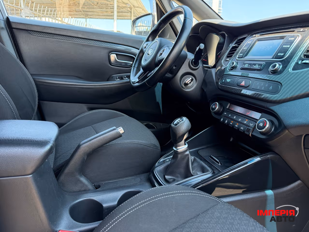 Kia Carens - фото 11