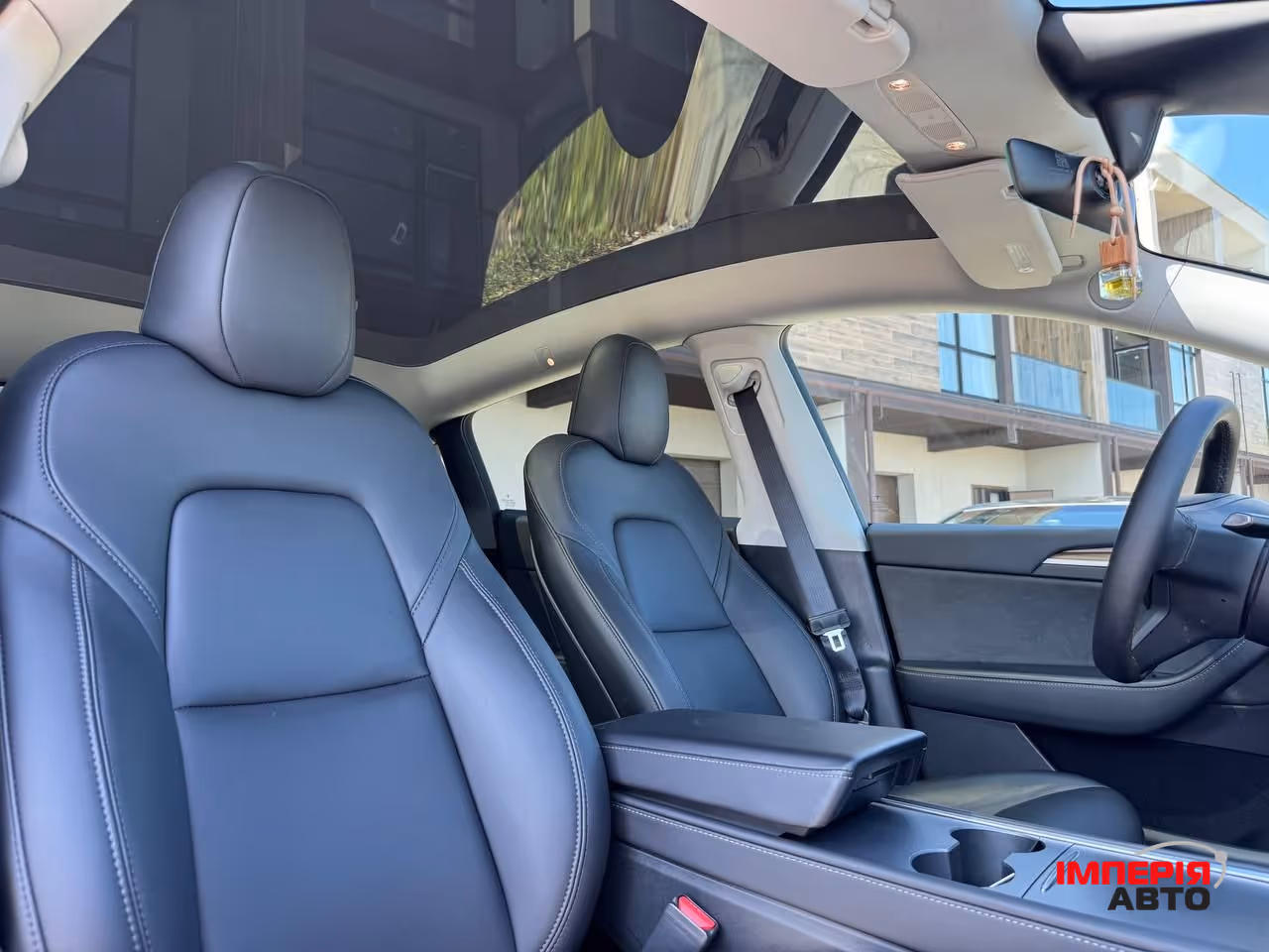 Tesla Model Y - фото 8